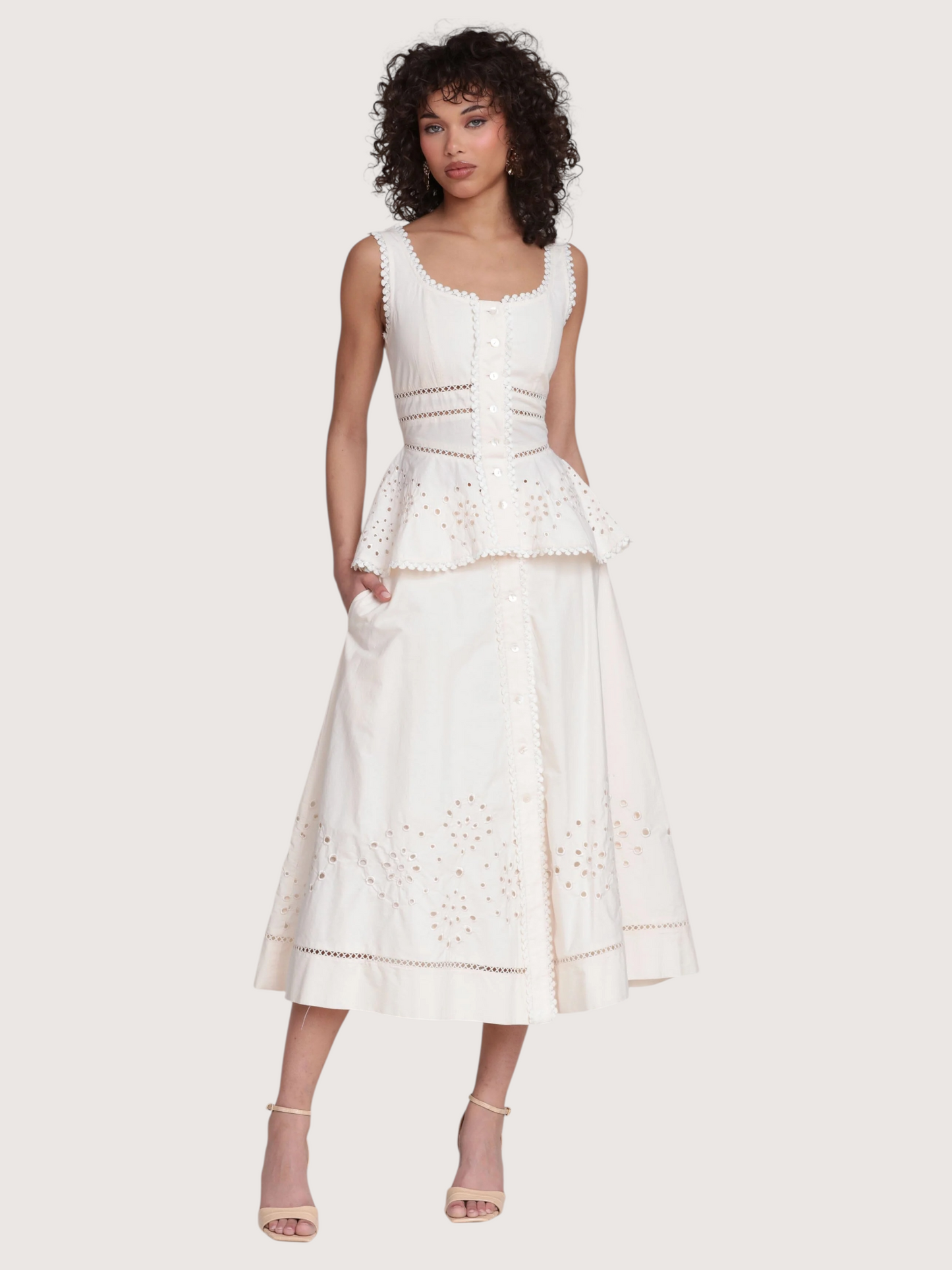 Embroidered Peplum Top