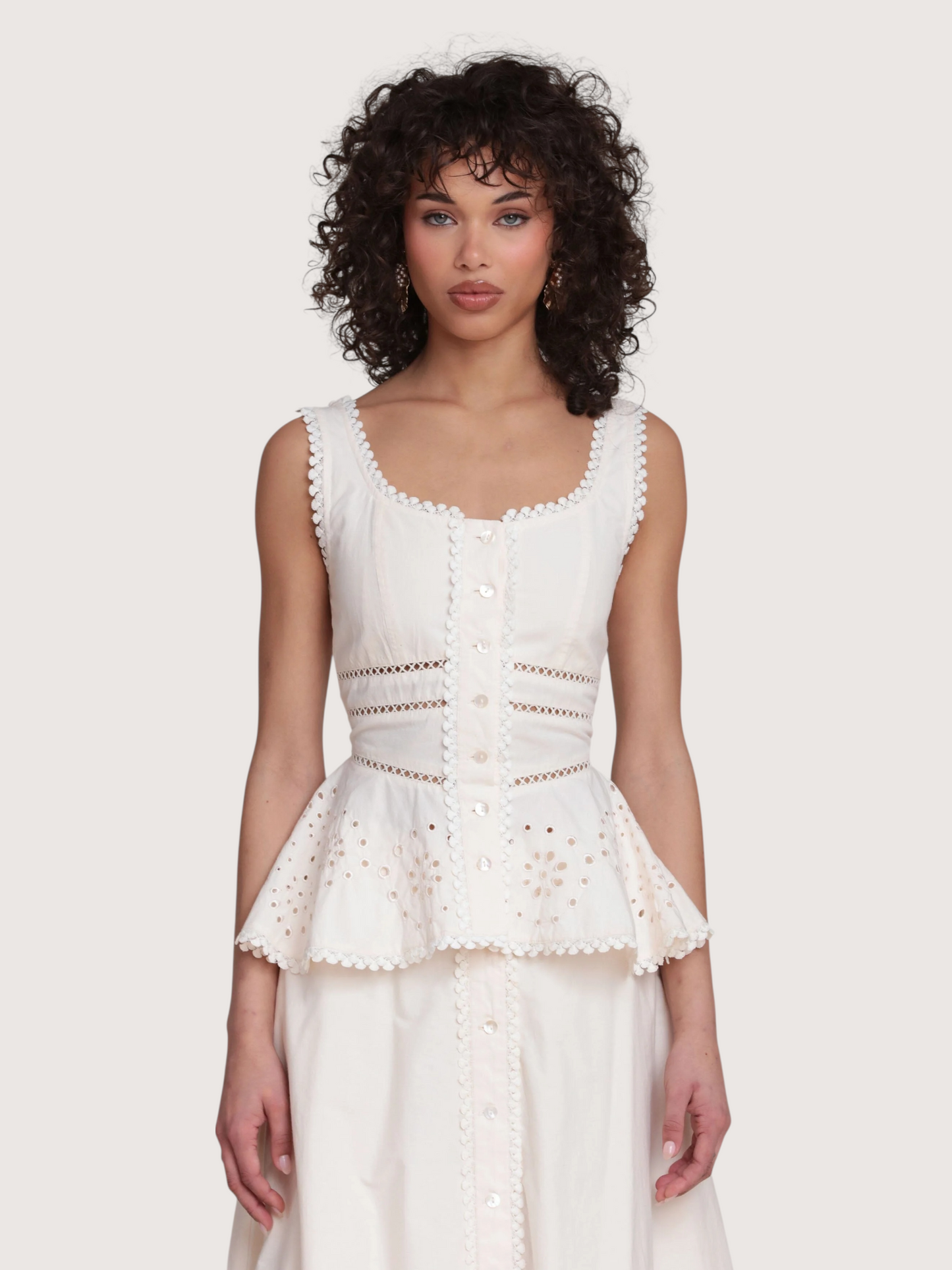 Embroidered Peplum Top