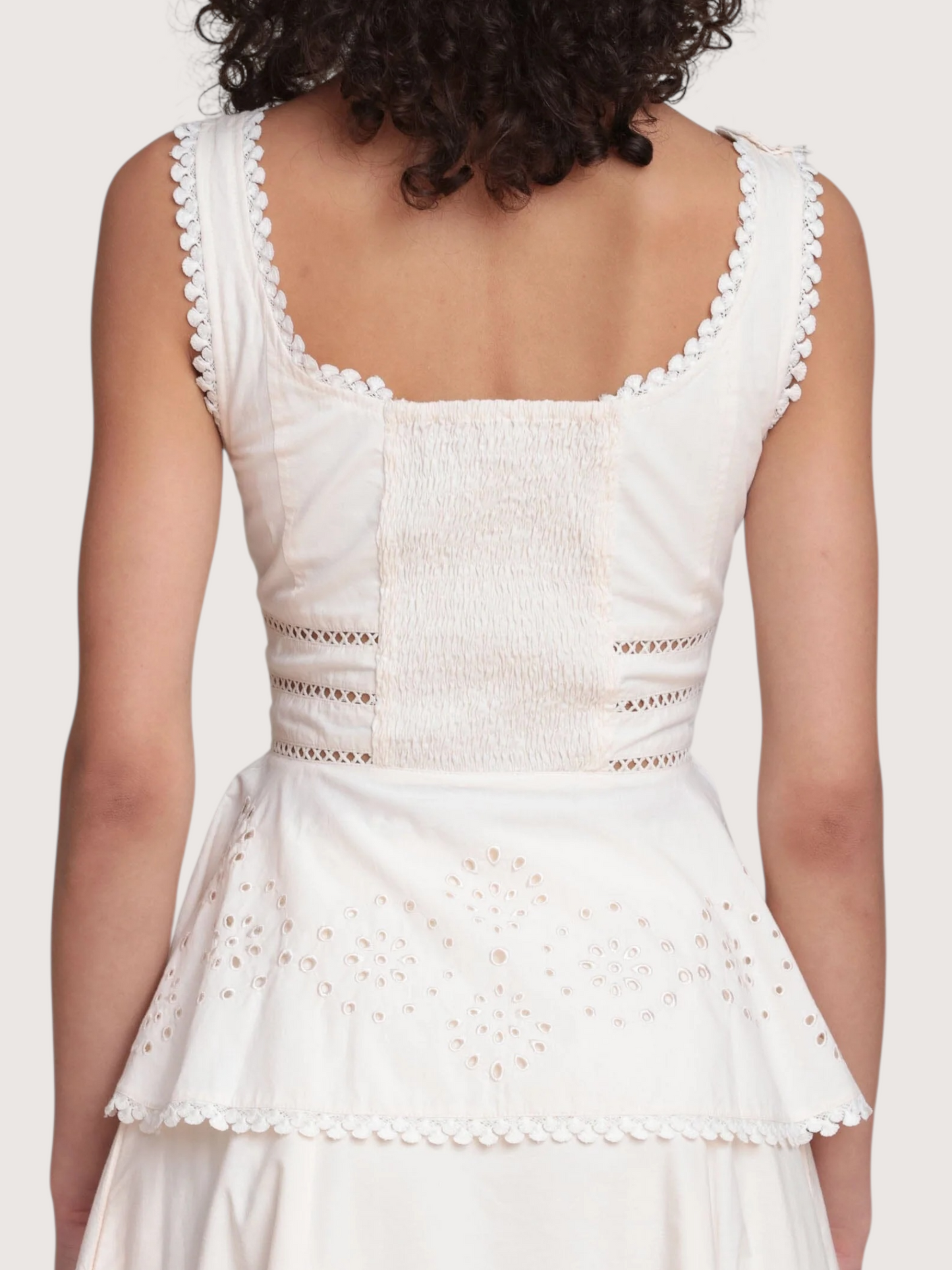 Embroidered Peplum Top